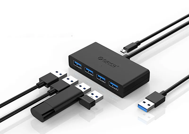 Black ORICO four-port USB hub shown beside accessory leads and a USB device