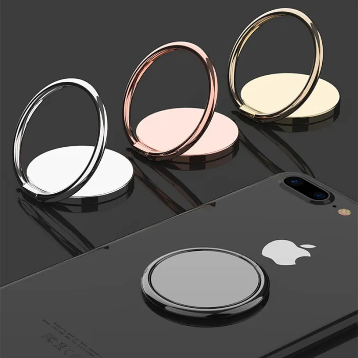 Phone ring stands shown in several finishes, including one mounted on a phone
