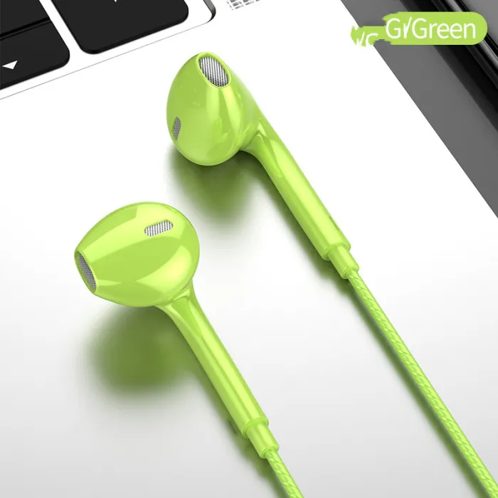 Green wired open-style earbuds shown against a laptop background